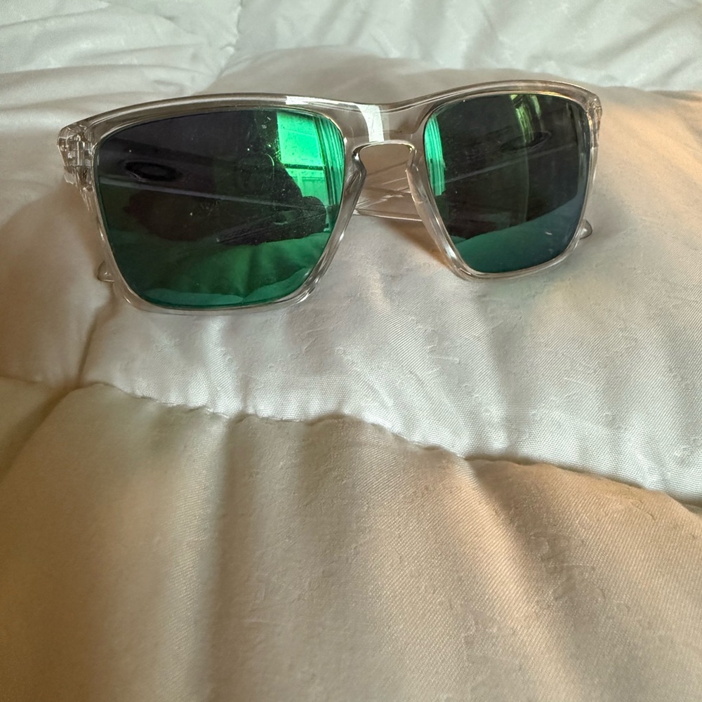 Oakley Clear Frame Sunglasses with Green Mirrored Lenses